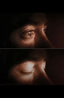 a close up of a person 's eyes with their eyes closed