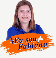 a woman in a blue shirt smiles in front of an orange sign that says #eu sou + fabiana