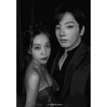 a black and white photo of a man and a woman with the caption btsvelvet.tvarmy