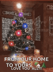 a christmas tree in a living room with the words from our home to yours