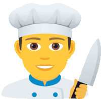 a chef is holding a large knife in his right hand