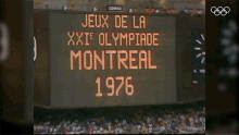 a sign that says " jeux de la xxie olympiade montreal 1976 "