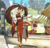 a woman in a red and white dress is holding a rabbit in her hand