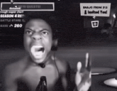 a man screaming in front of a screen that says snajo from 313 and invited you