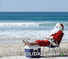 santa claus is sitting on the beach with his feet on a cooler and the words happy holidays josh below him