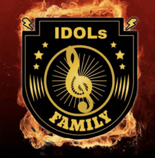 a logo for idols family with a treble clef and stars