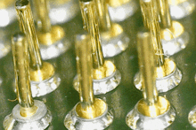 a close up of a bunch of gold and silver objects