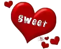 a large red heart with the word sweet on it