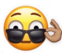 a smiley face is wearing sunglasses and giving the ok sign