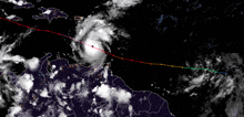 a satellite image of a hurricane moving through the caribbean