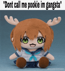 a stuffed animal with antlers and the words " dont call me pookie im gangsta " above it