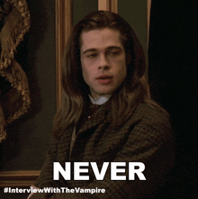 a picture of a man with long hair and the caption " never "
