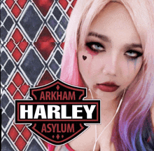 a harley davidson logo with a woman in a harley asylum costume behind it