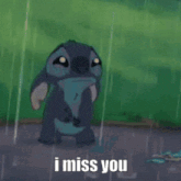 a cartoon of stitch laying in the rain with the words i miss you above him