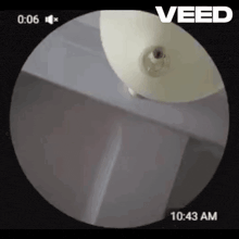 a video of a lamp being turned on at 10:43 am .