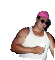 a man wearing a pink hat and sunglasses holds a cup in his hand