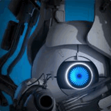 a close up of a robot 's head with a blue light coming out of it .