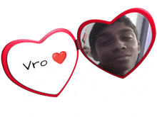 a picture of a man in a heart shaped mirror says vro