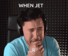 a man wearing headphones is crying with the caption when jet r.