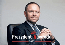 a man in a suit and tie sits in a chair with the words prezydent nawrocki 2025 on the bottom