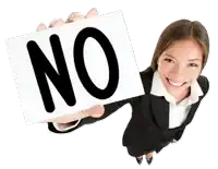 a woman in a suit holds a sign that says no