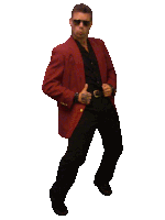 a man wearing a red jacket and black pants is giving a thumbs up