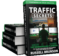 the book traffic secrets by russell brunson is stacked on top of each other