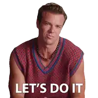 a man wearing a vest and a necklace says " let 's do it "