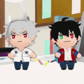two stuffed anime characters are standing next to each other and one has the number 99 on his jacket