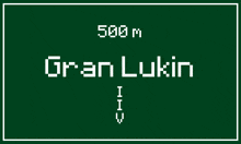 a green sign that says 500 m gran lukin in white letters