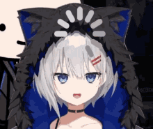 a girl with white hair and blue eyes is wearing a cat hood .