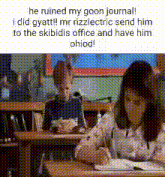 a boy and a girl are sitting at desks in a classroom . the girl is writing in a notebook .