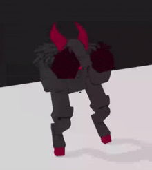 a cartoon character with red horns is standing in the snow