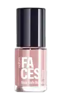 a bottle of natura faces nail polish in a nude color