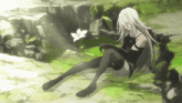 a woman with long white hair sits on a rock near a flower
