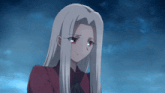 a girl with long white hair and red eyes is looking down