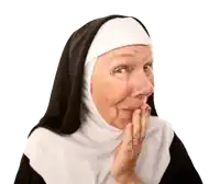 an older nun is covering her mouth with her hands