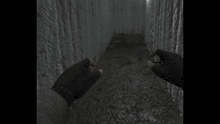 a hand in a black glove is reaching out towards a wall