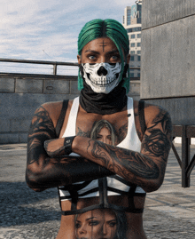 a woman with green hair is wearing a skeleton mask