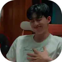 a young man wearing a white t-shirt that says theeraki valley on it
