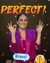 a woman in a pink jacket is giving a thumbs up in front of a perfect sign and a bravo sign