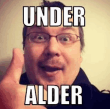 a man wearing glasses is giving a thumbs up and saying under alder .