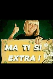 a woman giving a thumbs up while holding a sign that says ma ti si extra