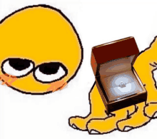 a yellow smiley face holds a box with a diamond ring in it