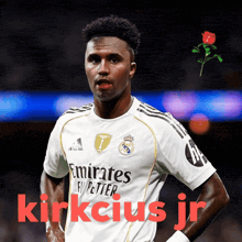 a soccer player named kirkcius jr is wearing an emirates fly better jersey
