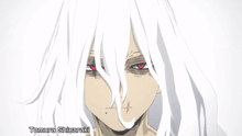 a close up of a person 's face with the name tomura shiozaki written below it