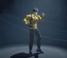 a man in a yellow jacket and black pants is dancing in a dark room