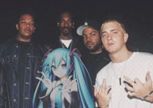a group of men posing for a picture with one of them holding a picture of a girl