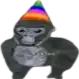 a gorilla is wearing a rainbow party hat .