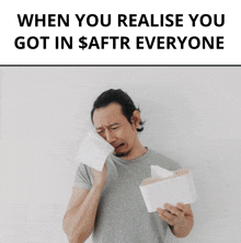 a man blowing his nose while holding a box of tissues with the caption when you realise you got in $ aftr everyone